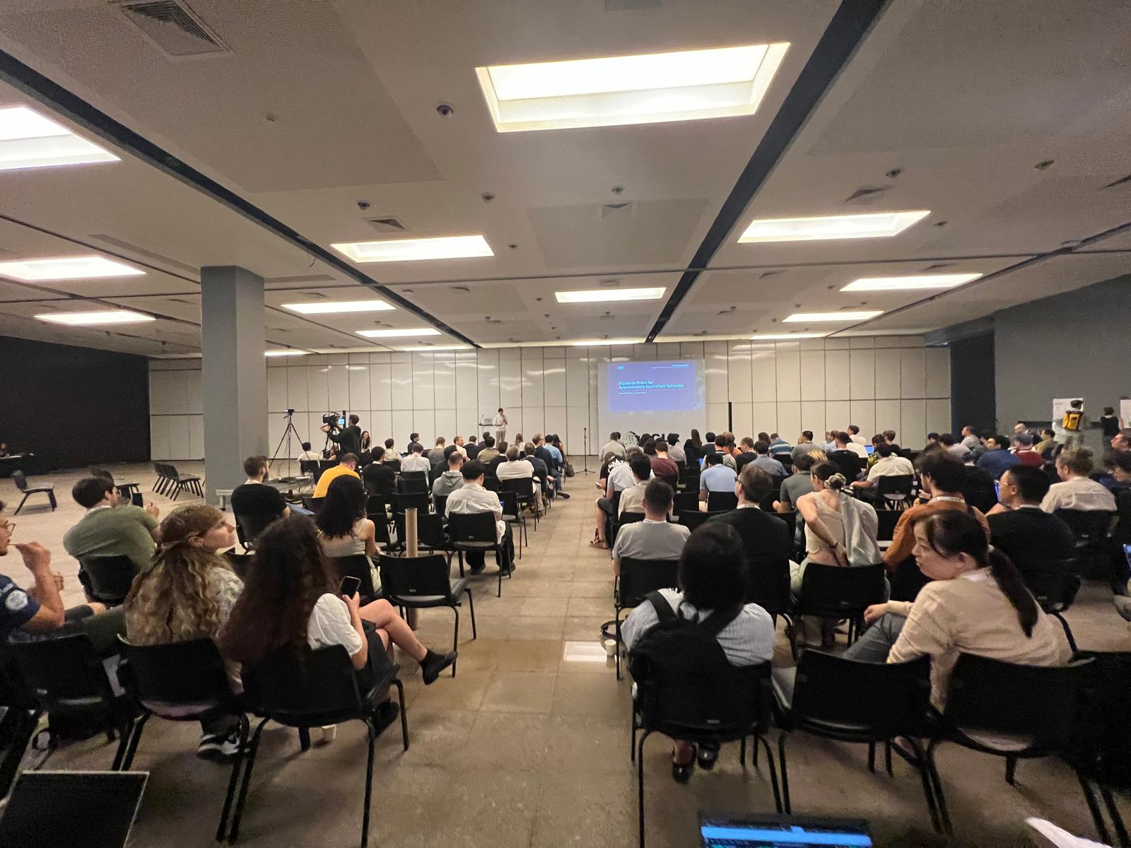 A view from the audience of Riccardo Ali presenting Algebraic Priors for Approximately Equivariant Networks at the GRaM workshop at ICLR 2026.